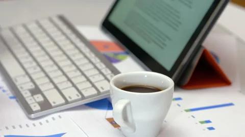 Cup of coffee while working Stock Footage 65499722
