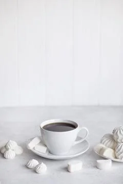 Cup of coffee on white background. Marshmallows Stock Photos