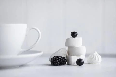 Cup of coffee, white background. Marshmallows Stock Photos