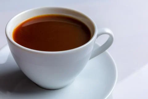 A cup of coffee on a white background Fotos de archivo