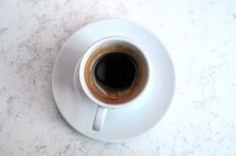 Cup of coffee with a white background Stock Photos