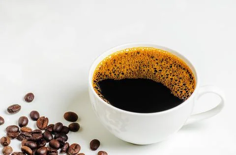 A cup of coffee on white background Stock Photos