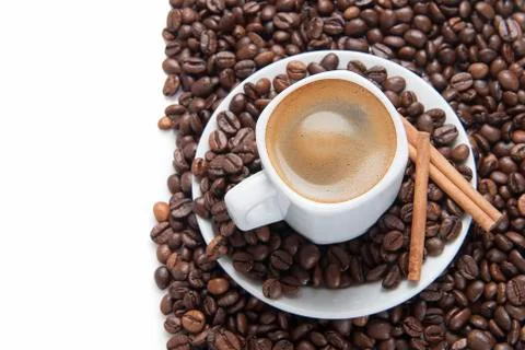 Cup of coffee on a white surface. Stock Photos
