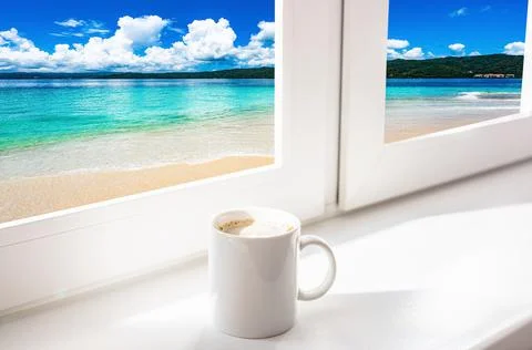 Cup of coffee on the window Foto stock