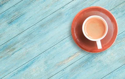 Cup of coffee on a wood table background. Stock-Fotos