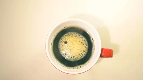 Cup of coffee on wooden table Video stock 59914771