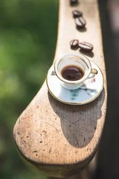 Cup of coffee on wooden table. Stock Photos