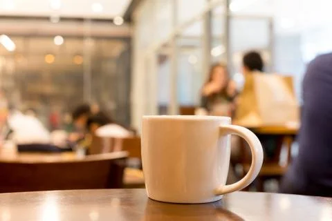 Cup of coffee with on wooend table Stock Photos