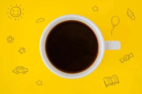 A cup of coffee on a yellow background Stock Photos