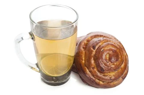 Cup of cold tea with bun Stock Photos