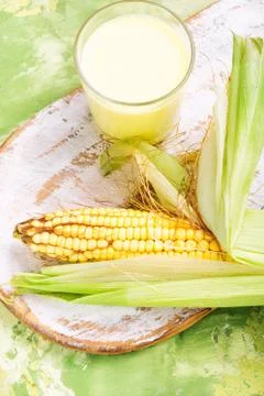 Cup of corn milk Stock Photos