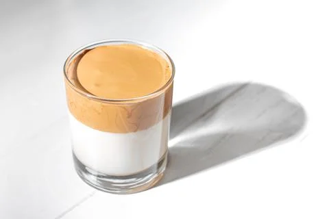 A cup of dalgon coffee on a light background Stock Photos