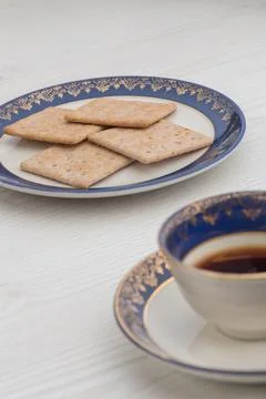 Cup of dark coffee on a white table Foto stock