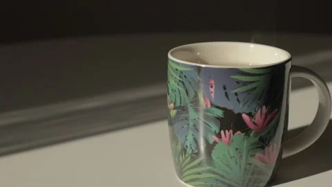 A cup of delicious aromatic hot tea stands on a white table Stock Footage 219508721