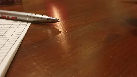 Cup of dice being turned over onto a table during a board game. Static Stock Footage 175320869
