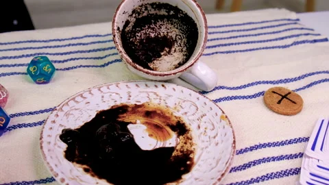 A cup of divination on coffee grounds. Selective focus. Stock Footage 231250147