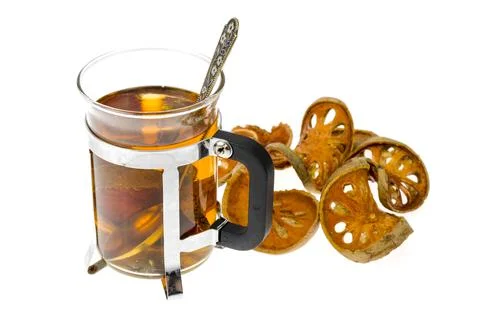 Cup of dried bael tea. Studio Photo Stock Photos