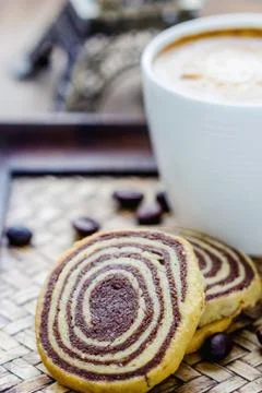 Cup of espresso and biscotti Stock Photos