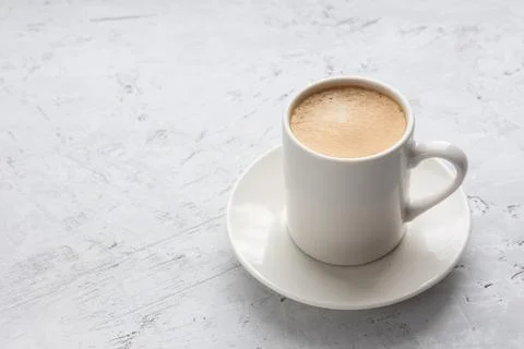 A cup of espresso on a gray background. Foto stock
