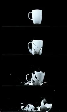 Cup falling and exploding on Black Background 스톡 사진