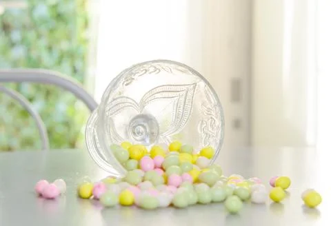 Cup filled with candy for Easter reversed Stock Photos