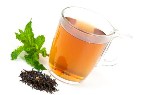 Cup of flavored black tea Stock Photos