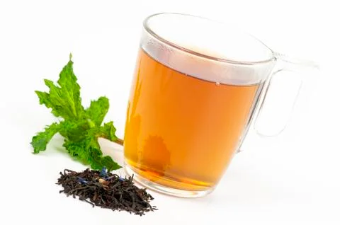 Cup of flavored black tea Stock Photos