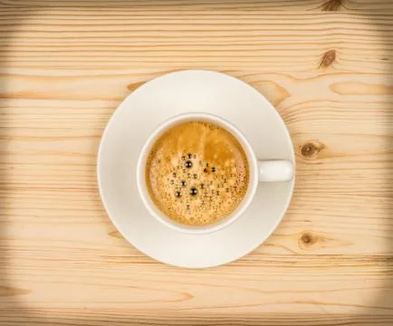 Cup of fresh espresso on table, view from above Stock Photos