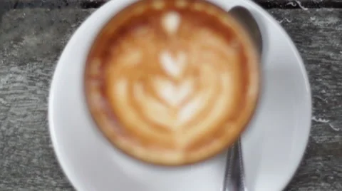 Cup of fresh latte on table Stock Footage 51368227