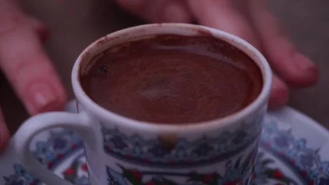 Cup of freshly brewed coffee in an outdoor cafe Stock Footage 130952453