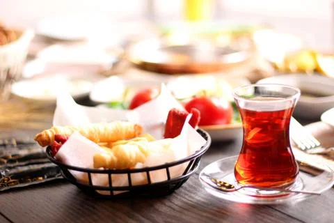 A cup of freshly-fermented tea for breakfast with bread and bread Tomato chee Stock Photos