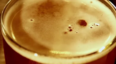 The cup full of beer in slow motion Stock Footage 67862690