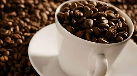 Cup full of coffee beans rotating, 4k, UHD Stock Footage 50100986