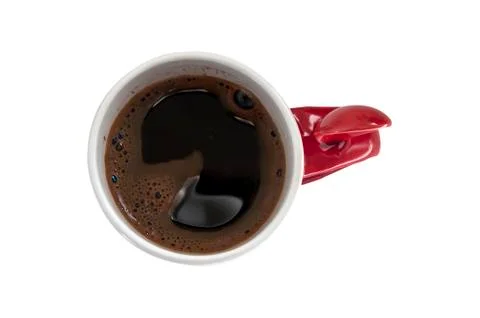 Cup of full coffee with spoon Stock Photos