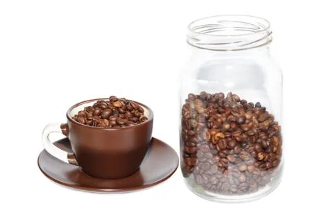 Cup full of roasted coffee beans Stock Photos