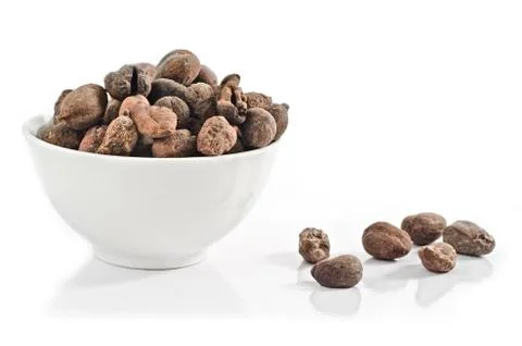 Cup full of shea nuts Stock Photos