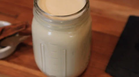 Cup of Full Whipping Cream Stock Footage 37420962