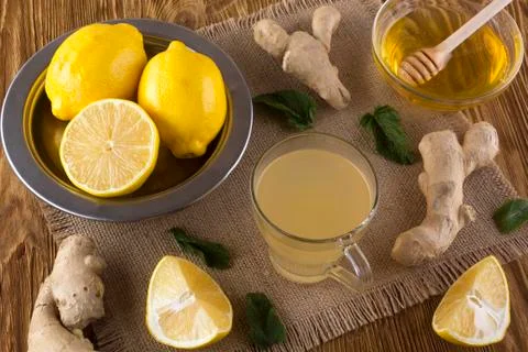 Cup of Ginger tea with lemon and honey. Stock Photos