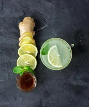 Cup of Ginger tea with lemon and honey. top view. vertical Foto stock