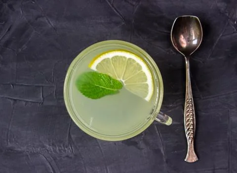 Cup of Ginger tea with lemon and mint. top view Stock Photos