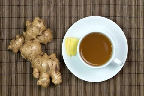 Cup of ginger tea Stock Photos