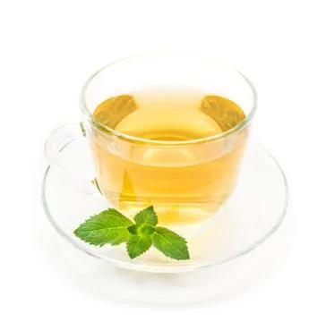 Cup of green chamomile tea with mint Stock Photos