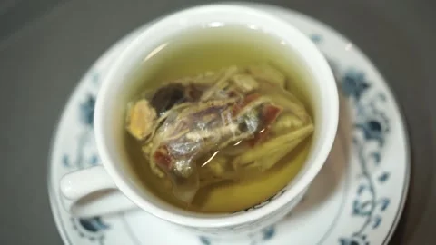A cup of green tea Stock Footage 261248329