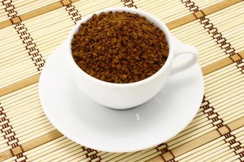 Cup of ground coffee Stock Photos