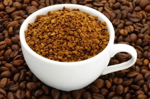 Cup of ground coffee Stock Photos
