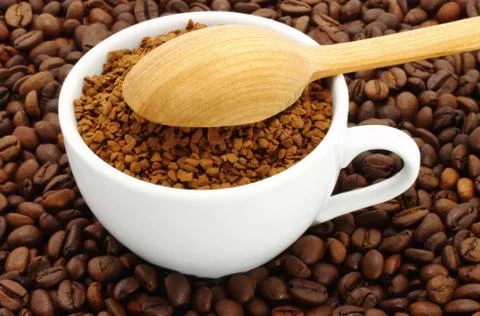 Cup of ground coffee Stock Photos