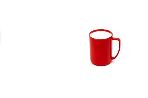 Cup with handle on a white background. Photos