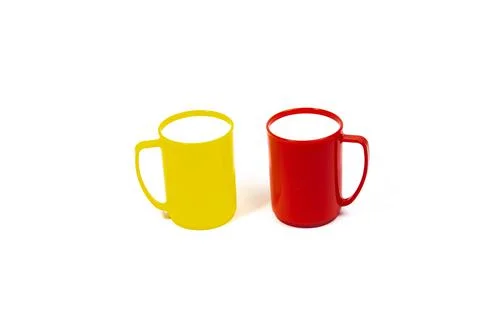 Cup with handle on a white background. Photos