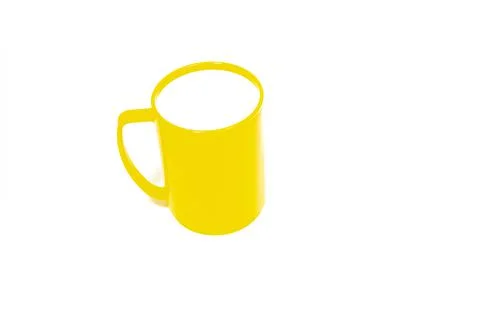 Cup with handle on a white background. Stock Photos