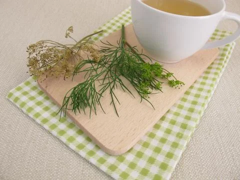 Cup of herbal tea with dill Stock Photos